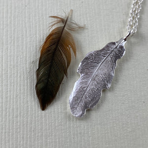 Hummingbird feather imprinted necklace from Gabriola Island, BC - Swallow Jewellery