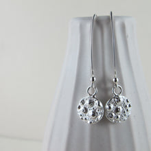Load image into Gallery viewer, Sea urchin imprinted dangle earrings from MacKenzie Beach, Tofino - Swallow Jewellery
