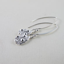 Load image into Gallery viewer, Sea urchin imprinted dangle earrings from MacKenzie Beach, Tofino - Swallow Jewellery