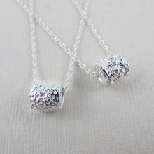 Load image into Gallery viewer, Whale bone imprinted infinity bead necklace from Victoria, BC - Swallow Jewellery