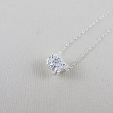 Load image into Gallery viewer, Whale bone imprinted infinity bead necklace from Victoria, BC - Swallow Jewellery