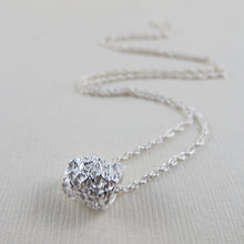 Load image into Gallery viewer, Whale bone imprinted infinity bead necklace from Victoria, BC - Swallow Jewellery