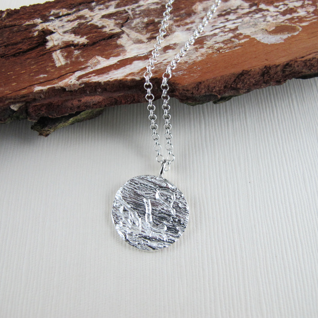 Cedar bark imprinted necklace from Malcom Island, BC - Swallow Jewellery
