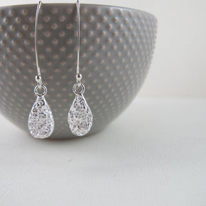 Whale bone imprinted dangle earrings from Victoria, BC - Swallow Jewellery
