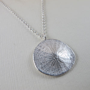 Middle beach sand dollar imprinted long necklace from Tofino, Vancouver Island - Swallow Jewellery