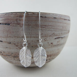 Wild rose leaf imprinted dangle earrings from Victoria - Swallow Jewellery
