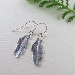 Hummingbird feather imprinted dangle earrings from Gabriola Island, BC by Swallow Jewellery