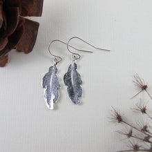 Load image into Gallery viewer, Hummingbird feather imprinted dangle earrings from Gabriola Island, BC by Swallow Jewellery