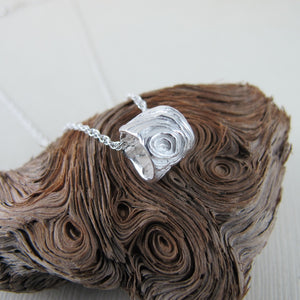 Driftwood imprinted infinity bead necklace from Mystic Beach, Vancouver Island - Swallow Jewellery
