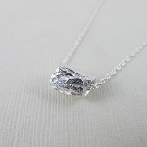 Arbutus bark imprinted infinity bead necklace from Galiano Island, BC - Swallow Jewellery