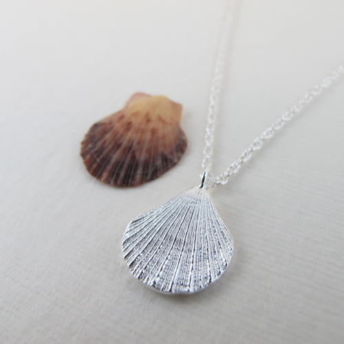 Mini scallop shell imprinted necklace from Chesterman Beach, Tofino