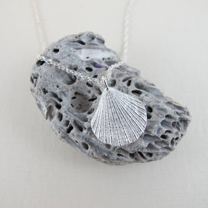Mini scallop shell imprinted necklace from Chesterman Beach, Tofino