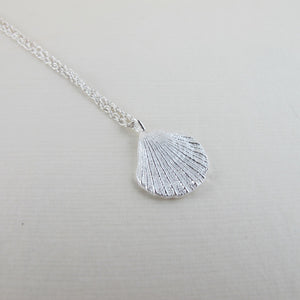 Mini scallop shell imprinted necklace from Chesterman Beach, Tofino